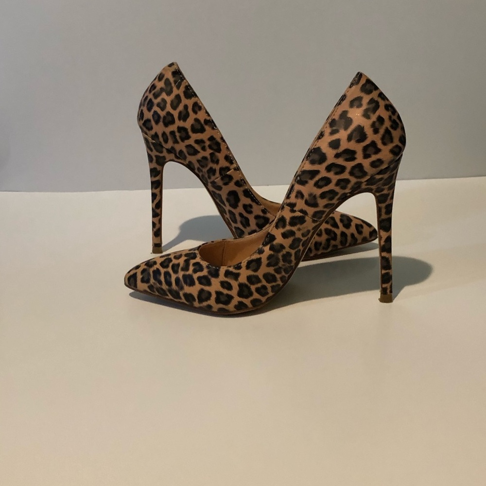 4 1/2 inch Leopard heels.
